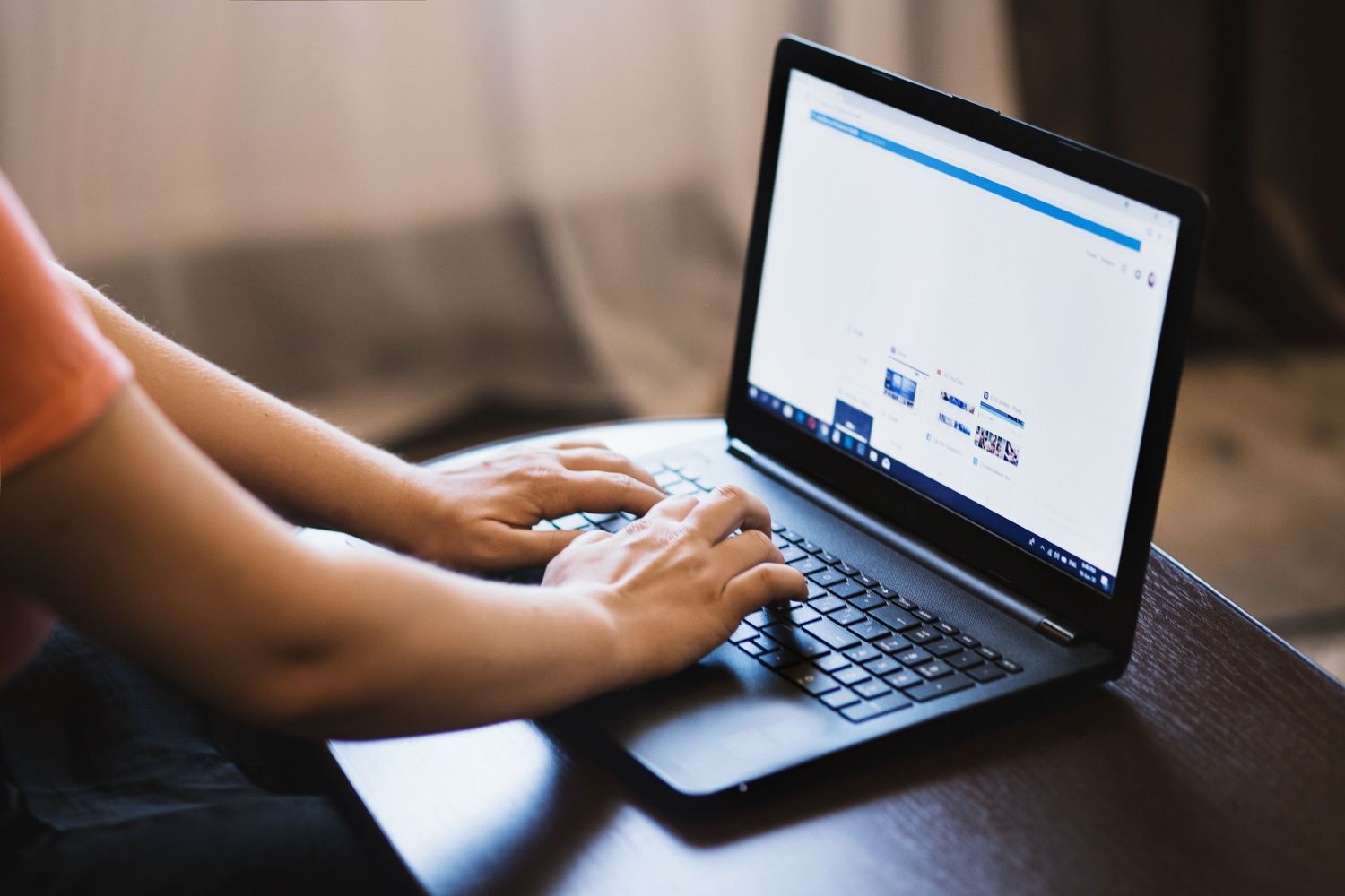 Respiratory-therapist-browsing-job-listings-on-a-laptop---we-care-staffing.jpg